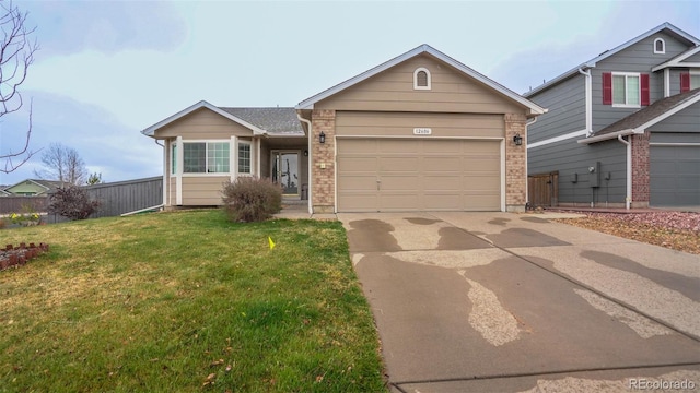 ranch-style house featuring an attached garage, concrete driveway, and brick siding
