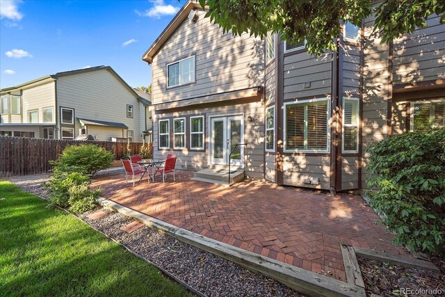 back of house featuring a patio area