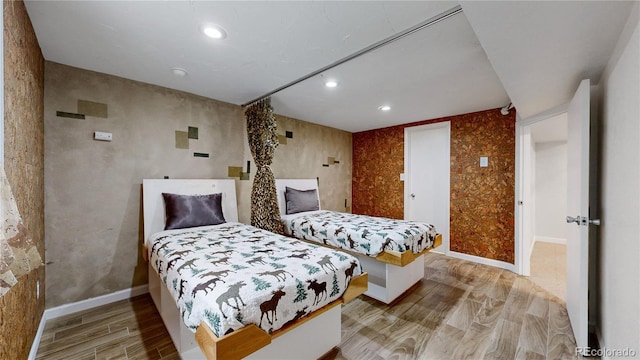 bedroom with light hardwood / wood-style flooring