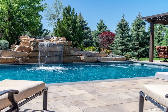 swimming pool featuring a patio area
