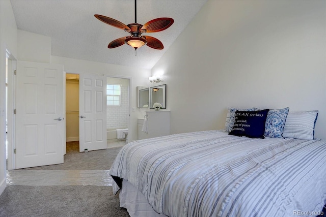 10359 W Fair Ave Unit F, Littleton, CO 80127 - bedroom with vaulted ceiling, ensuite bath, a walk in closet, a textured ceiling, and ceiling fan