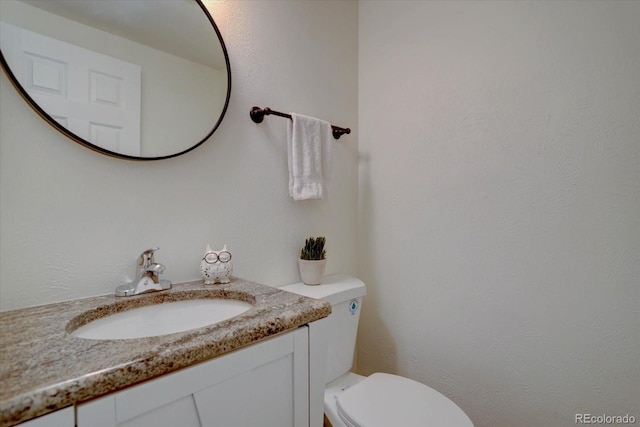 10359 W Fair Ave Unit F, Littleton, CO 80127 - bathroom with toilet and vanity