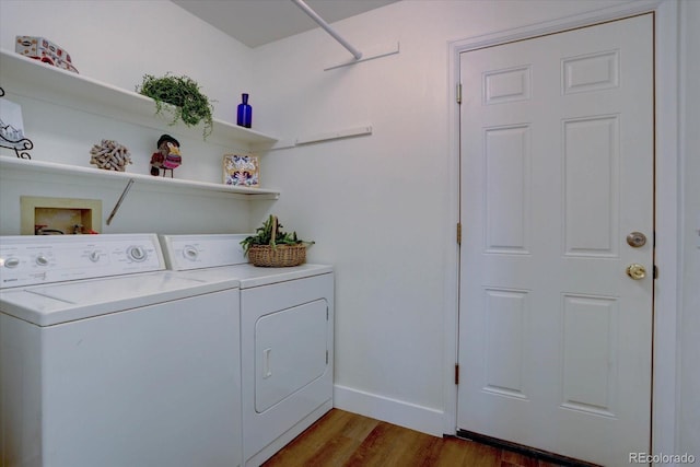 10359 W Fair Ave Unit F, Littleton, CO 80127 - washroom with washer and dryer and dark wood-style flooring