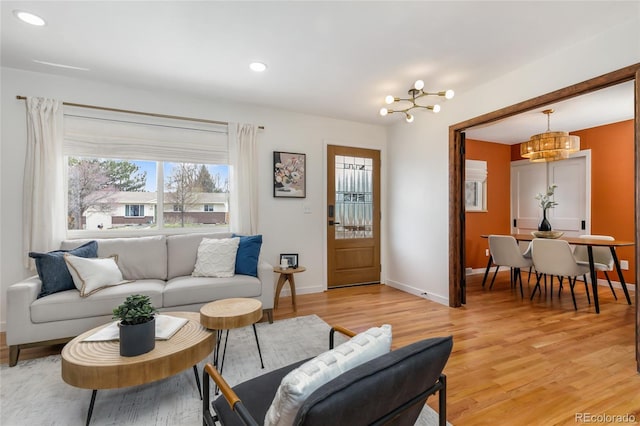 4655 Ludlow St, Boulder, CO 80305 - living room with light wood-type flooring, baseboards, recessed lighting, and a chandelier