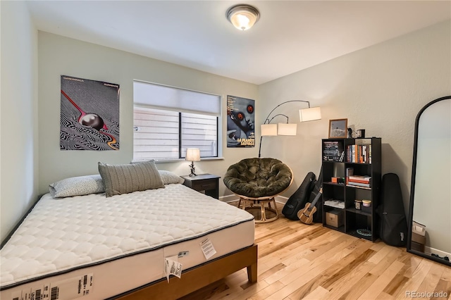 6213 Willow Ln, Boulder, CO 80301 - bedroom with light wood-style floors and baseboards