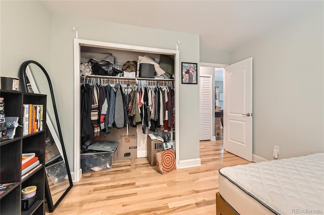 6213 Willow Ln, Boulder, CO 80301 - bedroom featuring light wood-style floors and a closet
