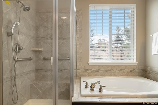 2724 Rising Moon Way, Castle Rock, CO 80109 - bathroom with a stall shower and a bath