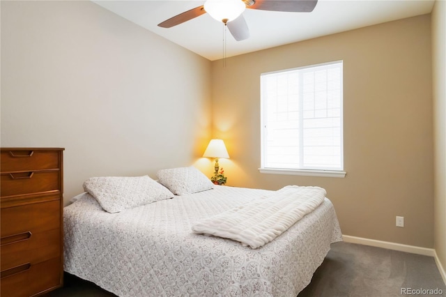 2724 Rising Moon Way, Castle Rock, CO 80109 - bedroom featuring baseboards, dark carpet, and ceiling fan