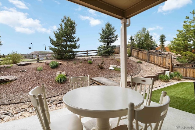 2724 Rising Moon Way, Castle Rock, CO 80109 - fenced backyard featuring a patio area and outdoor dining space