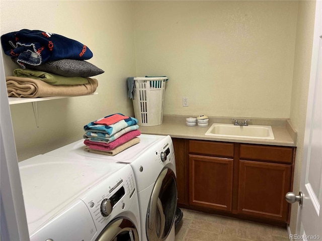 10636 Racine Cir, Commerce City, CO 80022 - laundry area with cabinets, washer and clothes dryer, and sink