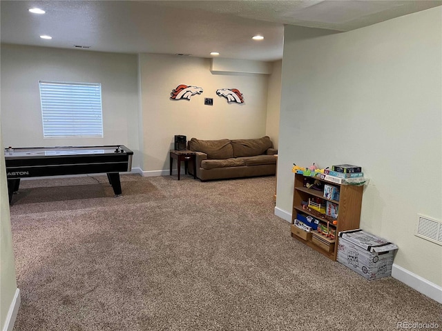 10636 Racine Cir, Commerce City, CO 80022 - rec room with carpet floors