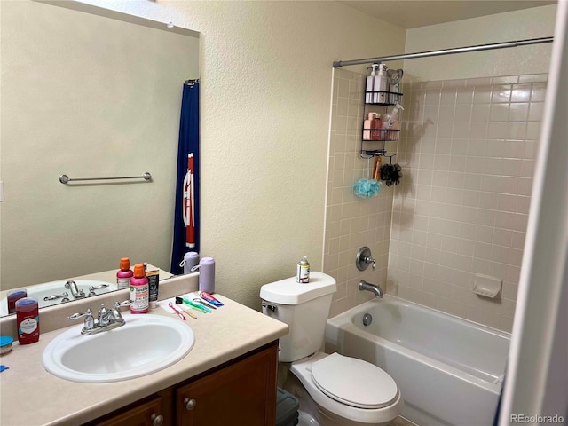 10636 Racine Cir, Commerce City, CO 80022 - full bathroom featuring tiled shower / bath, vanity, and toilet