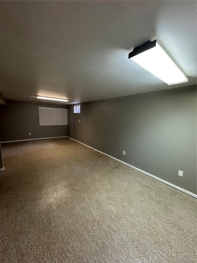 7020 W Portland Ave, Littleton, CO 80128 - additional living space featuring carpet flooring and baseboards