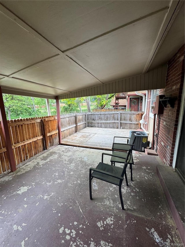 7020 W Portland Ave, Littleton, CO 80128 - fenced backyard with a patio area