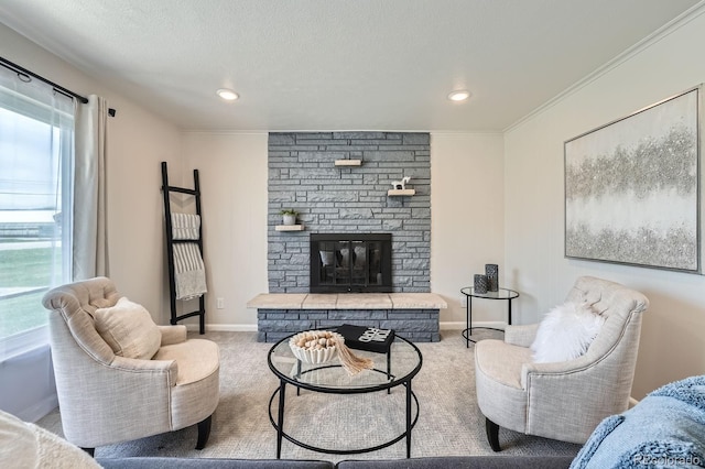 14505 W 52nd Ave, Arvada, CO 80002 - carpeted living room with a stone fireplace, recessed lighting, crown molding, and baseboards