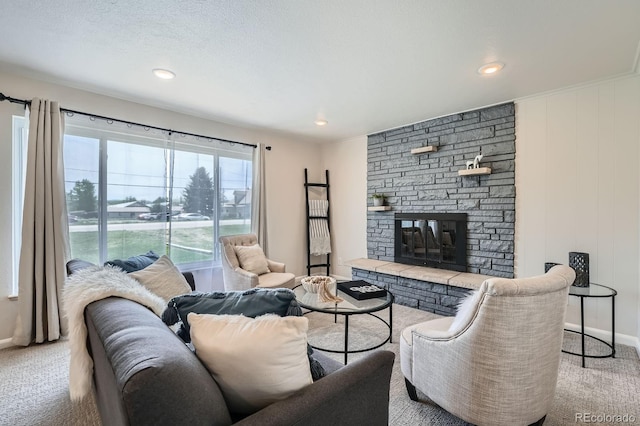 14505 W 52nd Ave, Arvada, CO 80002 - living room featuring a fireplace, light colored carpet, baseboards, and recessed lighting
