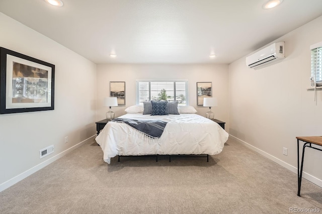14505 W 52nd Ave, Arvada, CO 80002 - bedroom featuring a wall unit AC, recessed lighting, carpet, and baseboards