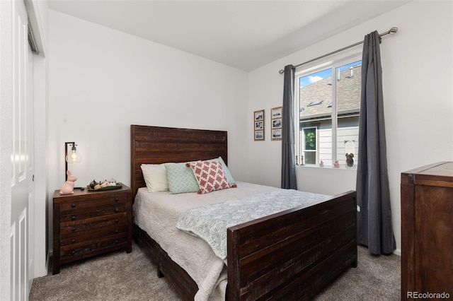 bedroom with light colored carpet