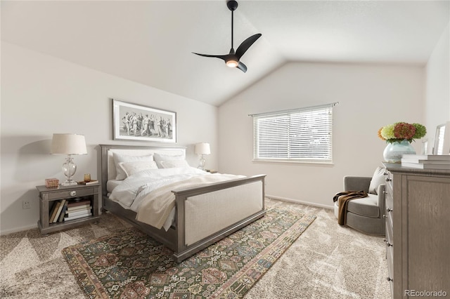 carpeted bedroom featuring ceiling fan and lofted ceiling