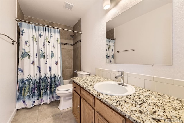 full bathroom featuring backsplash, tile patterned floors, vanity, shower / tub combo with curtain, and toilet