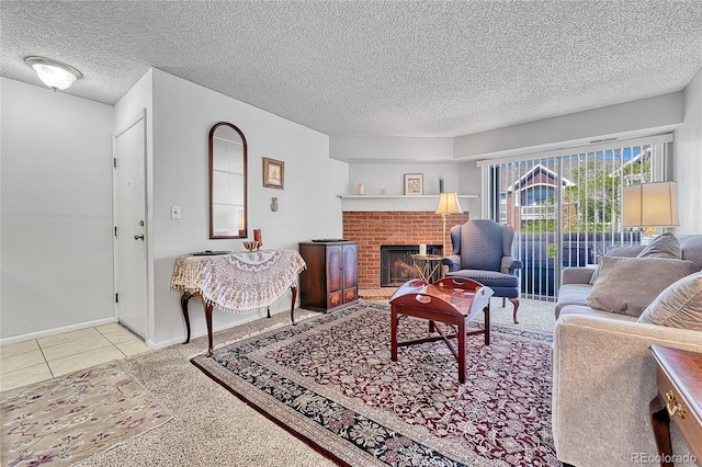 14226 E 1st Dr Unit B10, Aurora, CO 80011 - tiled living room featuring a textured ceiling and a fireplace