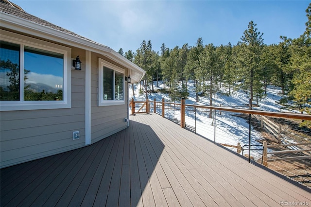 view of snow covered deck