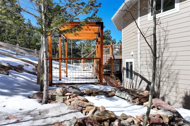 view of snow covered deck