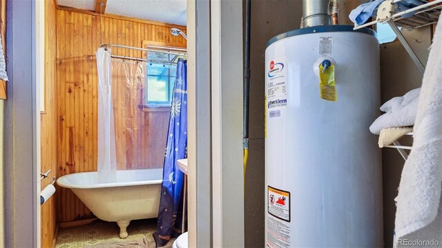 utility room with gas water heater