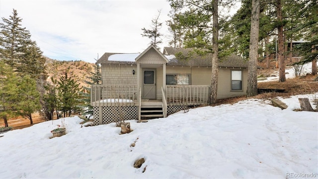 view of front of home with a wooden deck