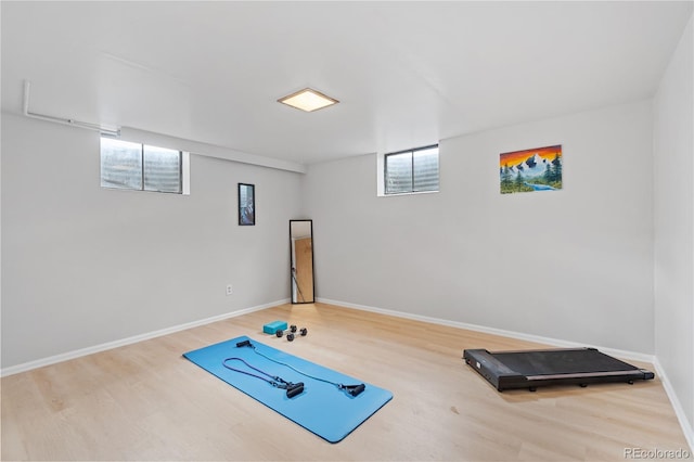 865 S Everett St, Lakewood, CO 80226 - workout room with baseboards and wood finished floors