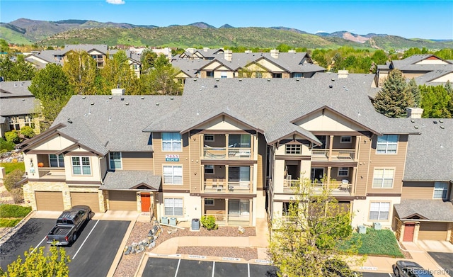 aerial view of residential area with a mountain backdrop