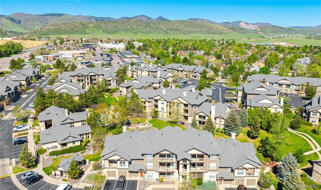 aerial view of residential area with a mountain backdrop