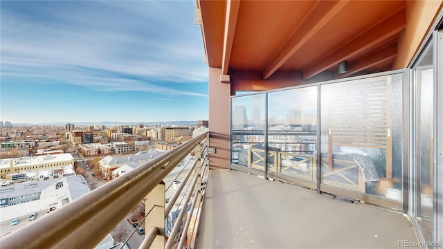 balcony featuring a city view