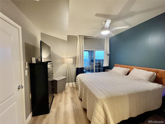 300 W 11th Ave Unit 10D, Denver, CO 80204 - bedroom featuring light wood-style floors, a ceiling fan, and baseboards