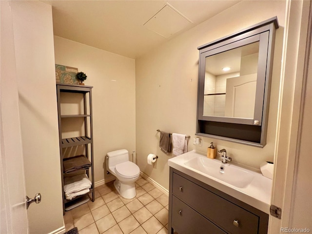 300 W 11th Ave Unit 10D, Denver, CO 80204 - bathroom featuring toilet, tile patterned flooring, vanity, and baseboards