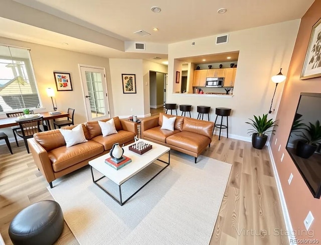 300 W 11th Ave Unit 10D, Denver, CO 80204 - living room with light wood-type flooring and recessed lighting