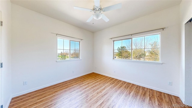 11374 Xavier Dr Unit 202, Westminster, CO 80031 - empty room featuring wood finished floors, baseboards, and a ceiling fan