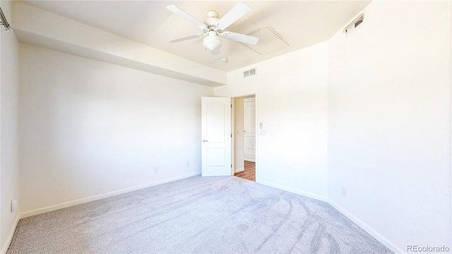 11374 Xavier Dr Unit 202, Westminster, CO 80031 - empty room with carpet, ceiling fan, baseboards, and attic access