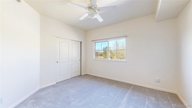 11374 Xavier Dr Unit 202, Westminster, CO 80031 - unfurnished bedroom featuring carpet flooring, baseboards, and a closet