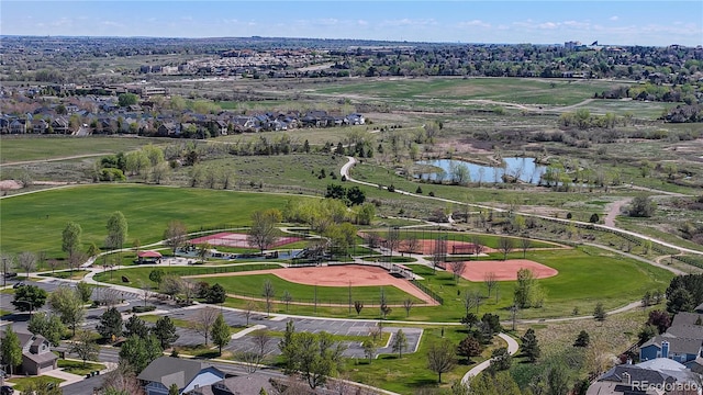 11374 Xavier Dr Unit 202, Westminster, CO 80031 - aerial perspective of suburban area with a nearby body of water and a golf course