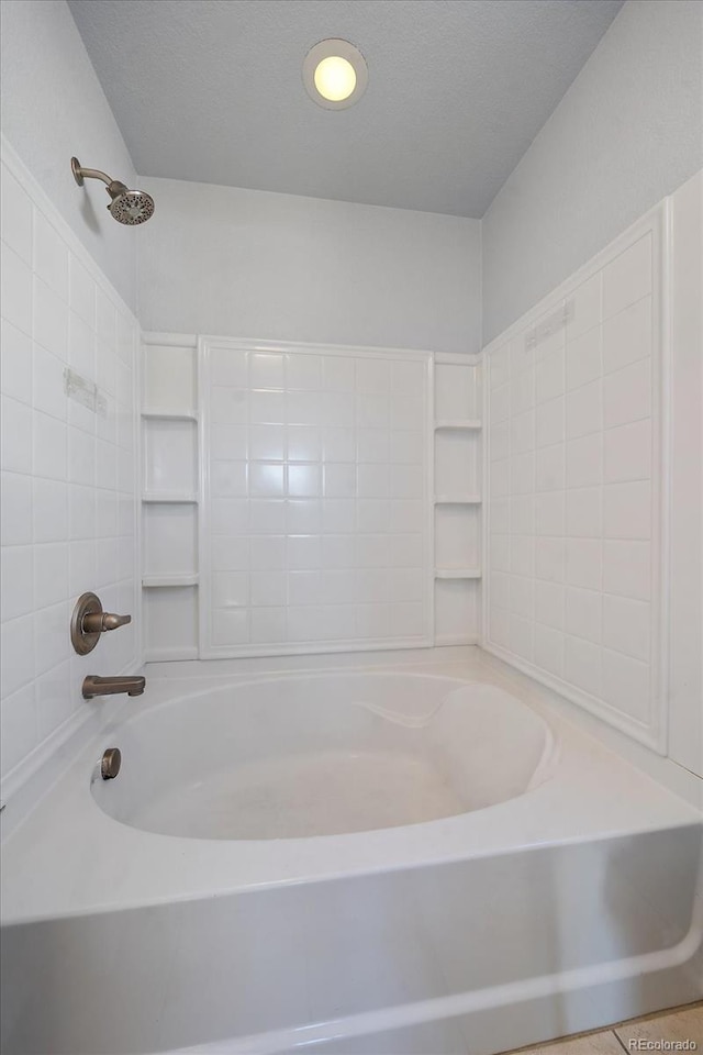 bathroom featuring shower / tub combination