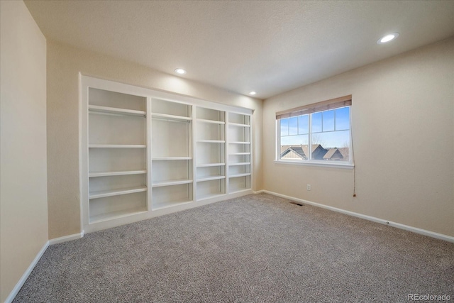 unfurnished bedroom featuring carpet floors