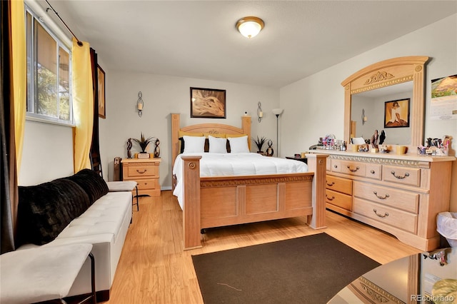 bedroom featuring light wood-type flooring