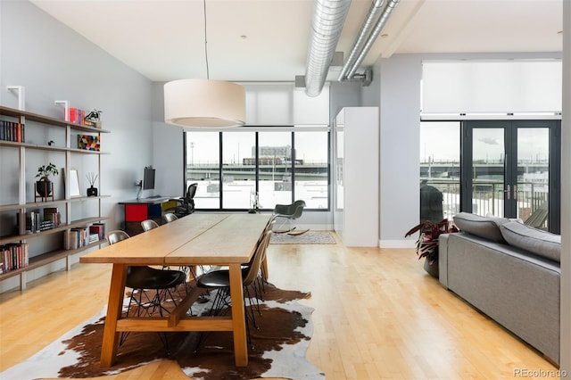 3100 Huron St Unit 3H, Denver, CO 80202 - dining space featuring wood finished floors
