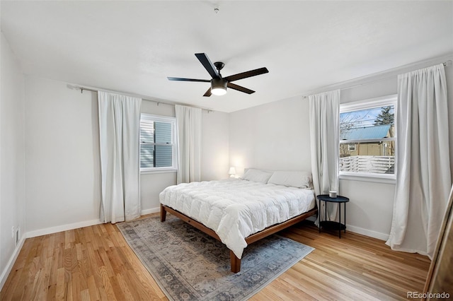 bedroom featuring ceiling fan and light hardwood / wood-style flooring