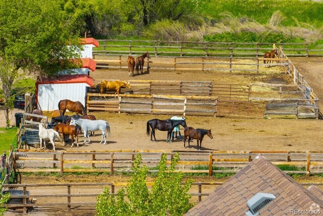 10369 E Red Mtn, Littleton, CO 80127 - surrounding community featuring an exterior structure and a rural view
