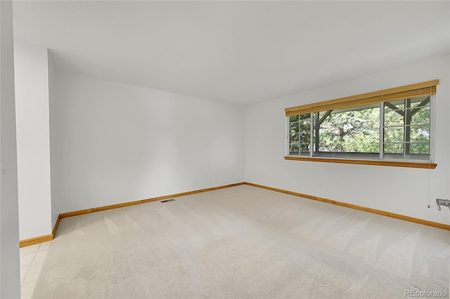 10369 E Red Mtn, Littleton, CO 80127 - carpeted spare room featuring baseboards