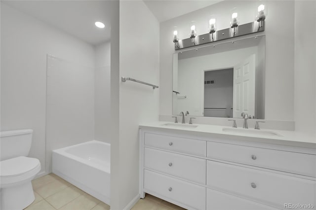 10369 E Red Mtn, Littleton, CO 80127 - bathroom with toilet, tile patterned floors, double vanity, and recessed lighting