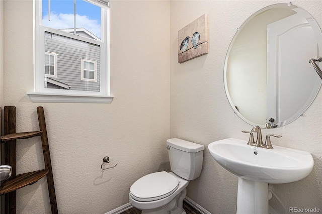 26267 E 3rd Ave, Aurora, CO 80018 - bathroom with toilet and a sink