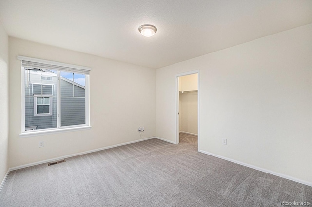 26267 E 3rd Ave, Aurora, CO 80018 - unfurnished bedroom with carpet and a spacious closet
